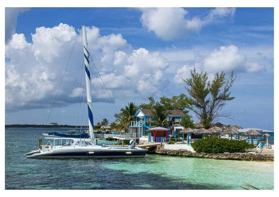 Bahamas: Swimming Pigs & Snorkeling Cruise with Lunch & Rum - Getting on board at Margaritaville: quick check-in, then you’re off