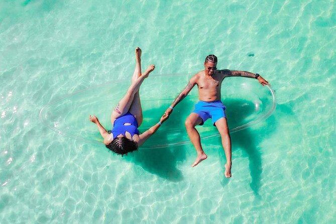 Beach Day and Clear Kayak Photoshoot in Bahamas - Stop 2 at Bert’s Blue dinghy: beach club time with a welcome drink