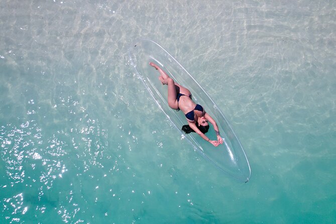 Clear Kayak Drone and Beach Private Photography in The Bahamas - Clear kayak posing coaching: Naomi and Anna make it feel doable