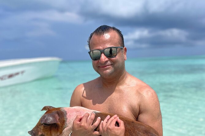 Nassau: 3 islands Pigs,Turtles,Snorkel & Beach Club with lunch - Stop 1, Pearl Island: coral reef snorkeling and feeding fish