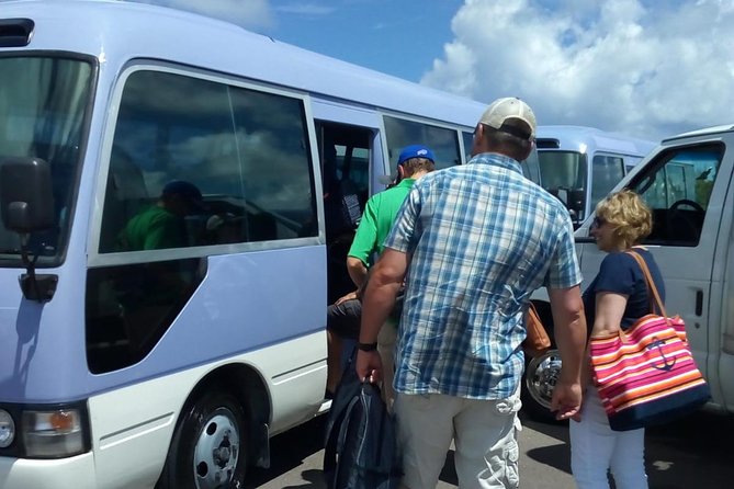 Nassau Airport Group Round-Trip Transfers - The 1-Hour Nassau Ride: Comfort With WiFi and Water