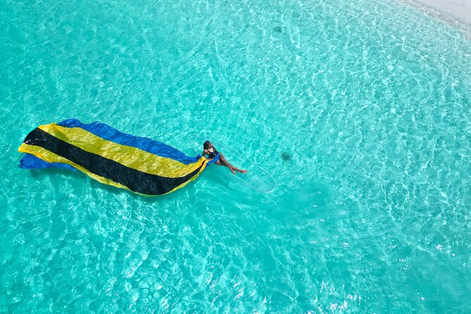 Nassau Clear Kayak Drone Photoshoot- Floating Dress - Saunders Beach in Nassau: Why This Spot Matters for Your Photos