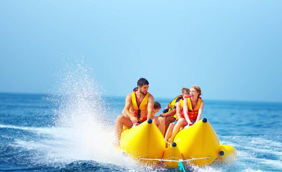Nassau: Jet Ski Ride, Parasailing & Banana Boat Tour - Stop 1: Cabbage Beach, where the action starts