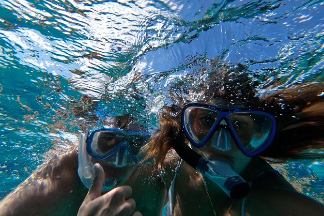 Ultimate SeaXscape Pigs/Turtles/Snorkel/Lunch/Drinks/PU/DO - The onboard vibe: music, comfort, and captains who run the day